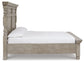 Harrastone King Panel Bed with Mirrored Dresser