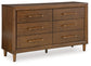 Lyncott Queen Upholstered Bed with Dresser